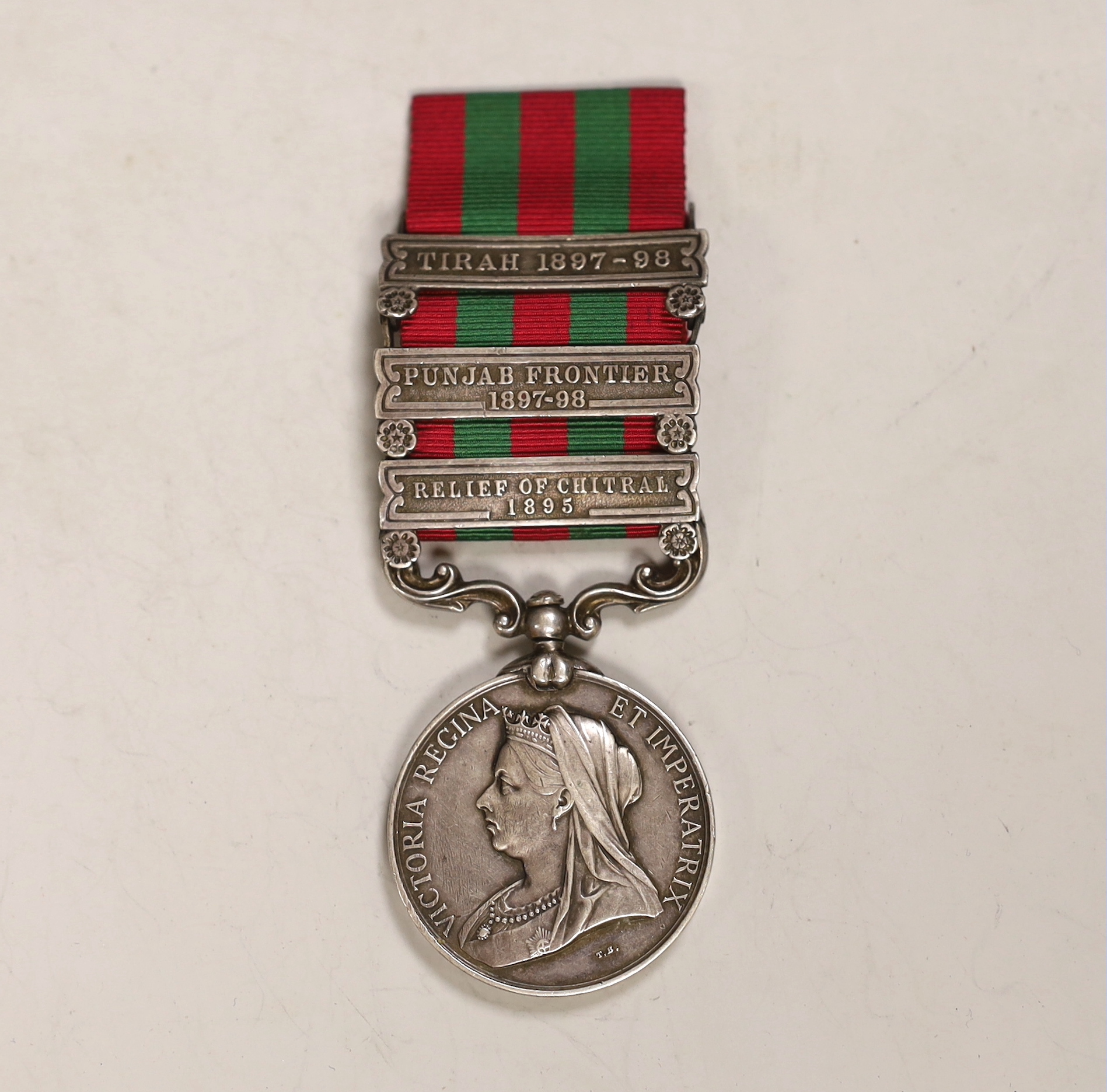 An India General Service medal 1895-1902 awarded to 4695 Pte J Wood 2nd, 13th King's Own Scottish Borders, with Tireh 1897-98, Punjab frontier 1897-98 and relief of Chitral 1895 clasps
